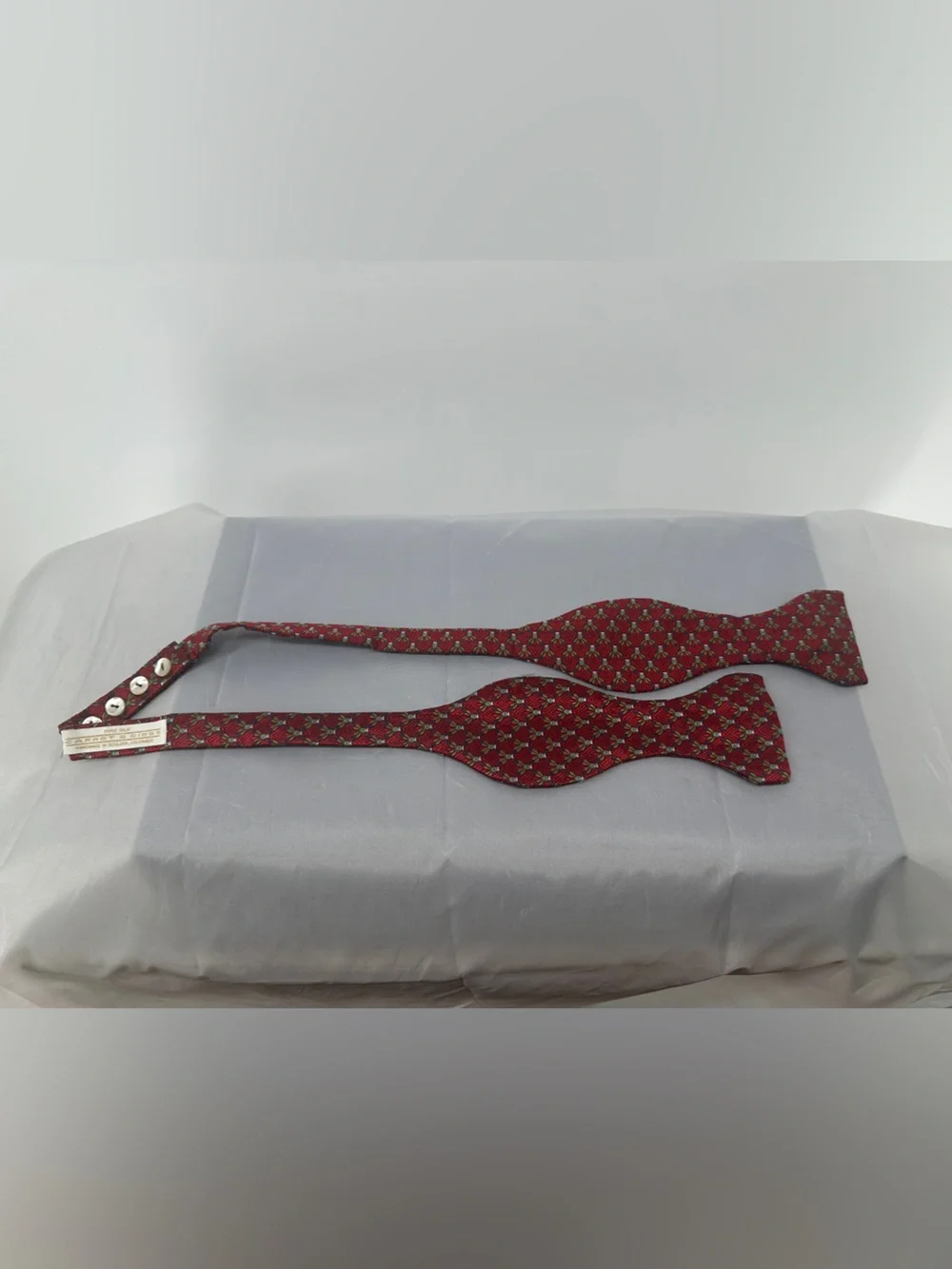 Carrot & Gibbe red jacquard patterned silk bow tie